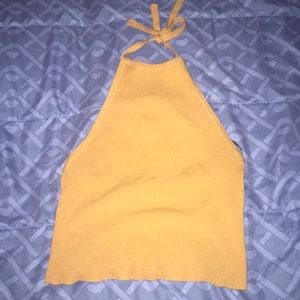Yellow backless halter top, with tie in the back.